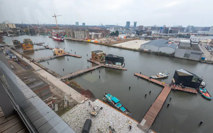 Schoonschip Intocht — bouwprojectenfotografie door Isabel Nabuurs